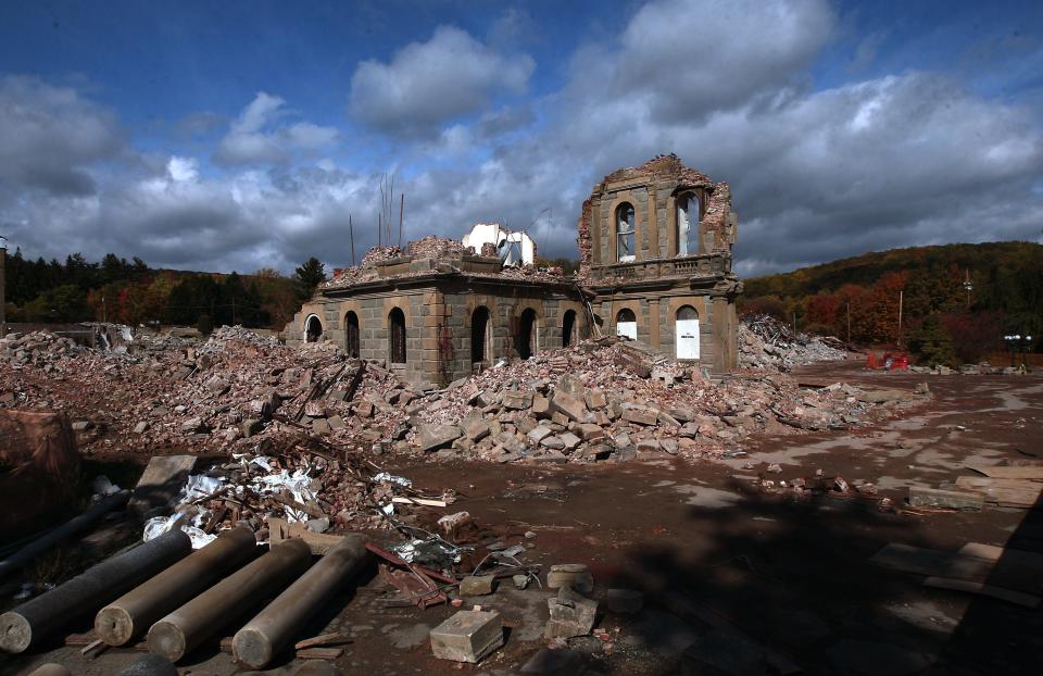 Greystone Park Psychiatric Hospital's majestic Kirkbride building which dates from back to 1876 taken down as demolition crews continued to work reducing the once historic site to rubble. October 25, 2015, Parsippany, NJ.