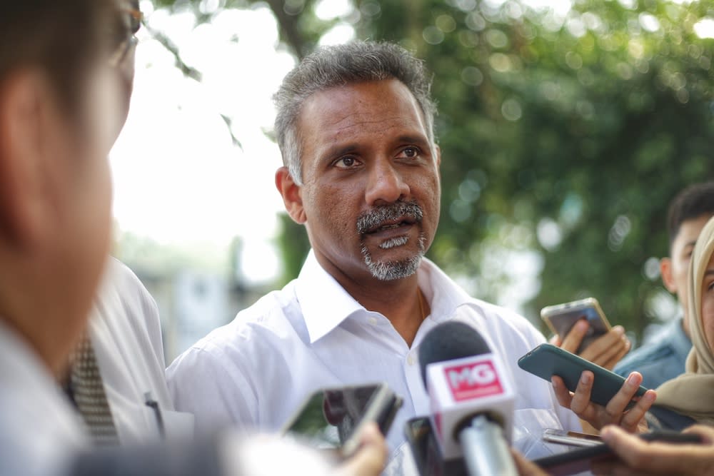 Lawyer/politician Ramkarpal Singh speaks to reporters outside Bukit Aman police headquarters in Kuala Lumpur October 14,2019. — Picture by Ahmad Zamzahuri