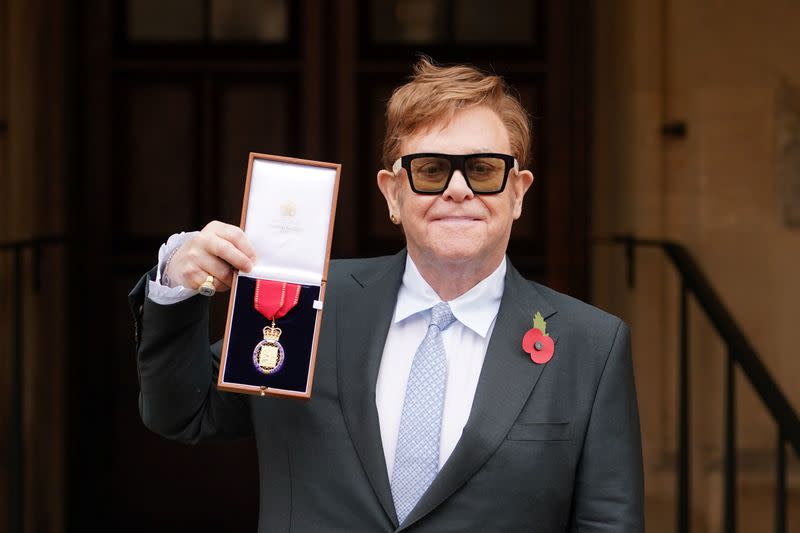 Elton John receives Order of the Companions of Honour in Windsor