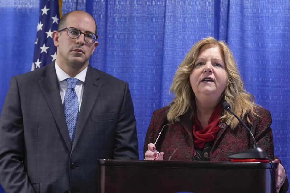 Nassau County District Attorney Anne Donnelly speaks while prosecutor Jared Rosenblatt looks on during a news conference after Richard Cottingham appeared remotely in a courtroom in Mineola, N.Y., Monday, Dec. 5, 2022. Cottingham, the serial murderer known as the "Torso Killer", admitted Monday to killing a 23-year-old woman outside a Long Island shopping mall in 1968 and four other women decades ago. (AP Photo/Seth Wenig)