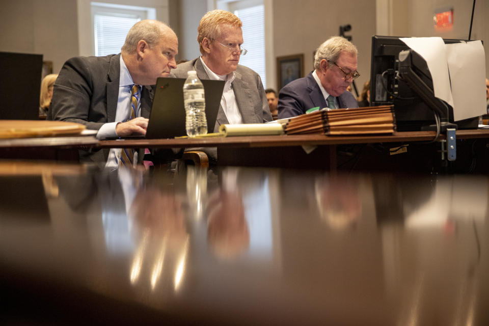 Defense attorney Jim Griffin, left, Alex Murdaugh, center, and Dick Harpootlian listen in during Murdaugh's double murder trial at the Colleton County Courthouse in Walterboro, S.C., Wednesday, Feb. 1, 2023. (Andrew J. Whitaker/The Post And Courier via AP, Pool)