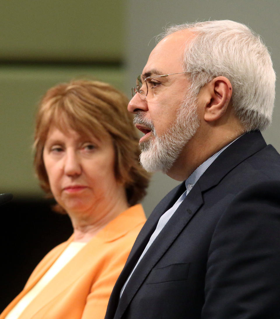 European foreign policy chief Catherine Ashton, left, and Iranian Foreign Minister Mohamad Javad Zarif, right, adress the media after closed-door nuclear talks in Vienna, Austria, Wednesday, March 19, 2014. They said the talks addressed Iran's uranium enrichment program, a nearly finished nuclear reactor and the lifting of sanctions on Iran that have been imposed successively over the past decade as Tehran expanded its atomic activities. The talks will resume April 7 in Vienna. (AP Photo/Ronald Zak)