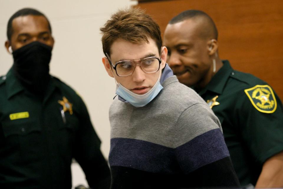 Marjory Stoneman Douglas High School shooter Nikolas Cruz entering court on 23 August (AP)