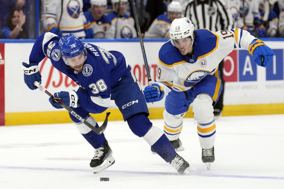 Tampa Bay Lightning left wing Brandon Hagel (38) beats Buffalo Sabres center Peyton Krebs (19) up the ice during the second period of an NHL hockey game Monday, April 15, 2024, in Tampa, Fla. (AP Photo/Chris O'Meara)