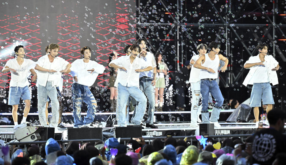 K-pop group The Boyz performs during a K-Pop concert after the closing ceremony of the World Scout Jamboree at the World Cup Stadium in Seoul, South Korea, Friday, Aug. 11, 2023. Flights and trains resumed and power was mostly restored Friday after a tropical storm blew through South Korea, which was preparing a pop concert for 40,000 Scouts whose global Jamboree was disrupted by the weather. (Korea Pool via AP)