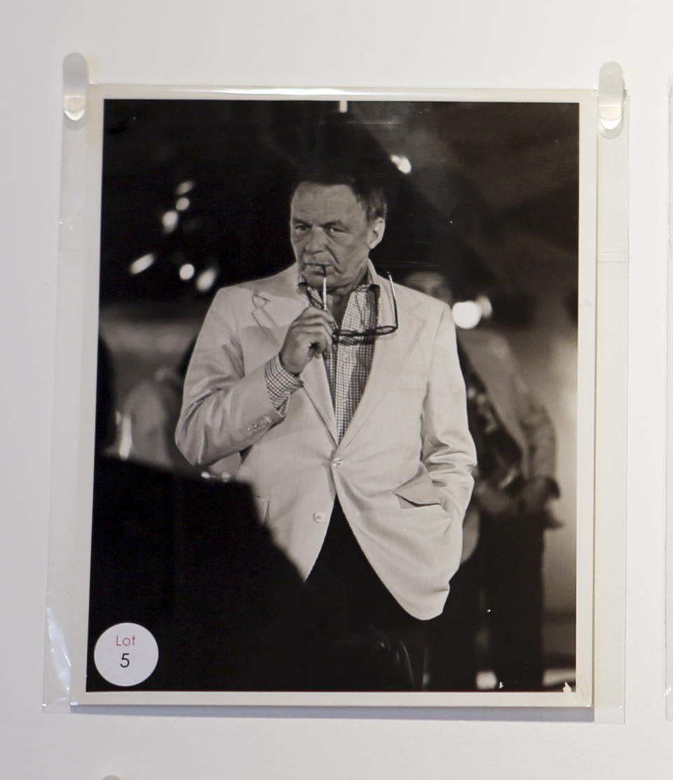 This Jan. 16, 2013 image shows a photograph of the late Frank Sinatra, owned by Studio 54 club co-founder Steve Rubell, on display in West Palm Beach, Fla.Memorabilia from the famed 1970s club is hitting the auction block in Florida. The private collection of co-founder Steve Rubell is being sold Saturday in West Palm Beach. (AP Photo/Alan Diaz)