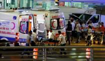 Paramedics push a stretcher at Turkey's largest airport, Istanbul Ataturk, Turkey, following a blast June 28, 2016. REUTERS/Osman Orsal