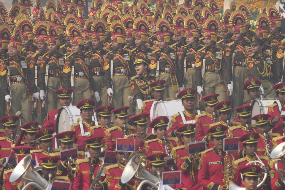 Indian defense forces march on the ceremonial street Kartavyapath boulevard during India's Republic Day parade celebrations in New Delhi, India, Friday, Jan. 26, 2024. (AP Photo/Manish Swarup)