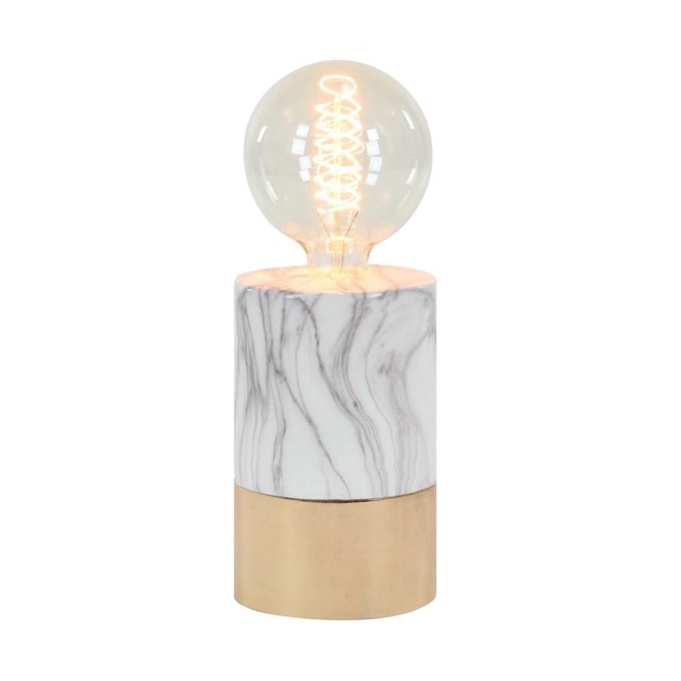 <a rel="nofollow noopener" href="https://www.overstock.com/Home-Garden/Studio-350-Ceramic-Lamp-W-Bulb-5-inches-wide-14-inches-high/17336938/product.html" target="_blank" data-ylk="slk:SHOP NOW;elm:context_link;itc:0;sec:content-canvas" class="link ">SHOP NOW</a>: Ceramic lamp with bulb by Studio 350, $43, overstock.com