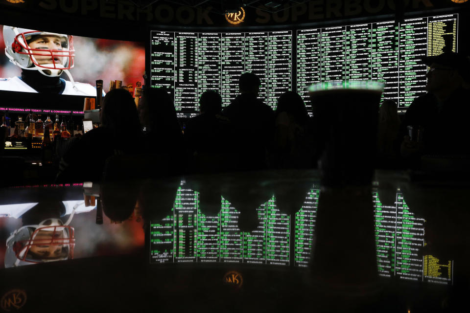 Prop bets for Super Bowl LIII are on display before the start of the game at the Westgate Superbook sports book, Sunday, Feb. 3, 2019, in Las Vegas. (AP Photo/John Locher)