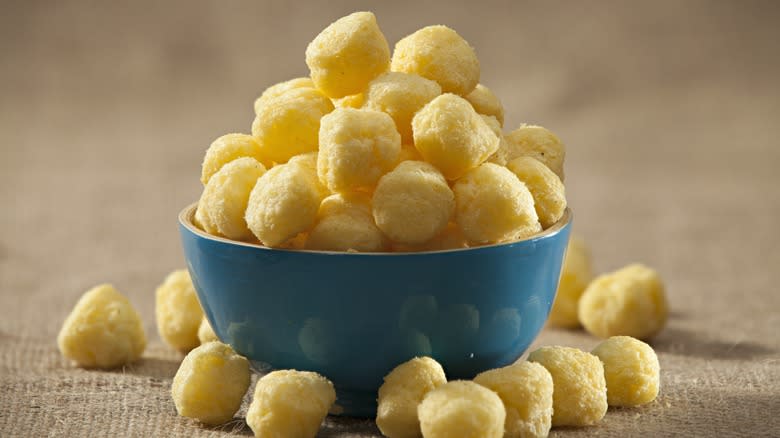 blue bowl filled with corn pops 