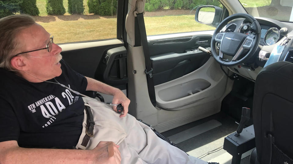Paul Spooner, director of the MetroWest Center for Independent Living, had a van that was adapted to allow him to drive.
