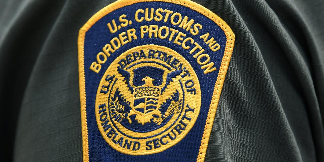 FILE PHOTO: A U.S. Customs and Border Protection patch is seen on the arm of a U.S. Border Patrol agent in Mission, Texas, U.S., July 1, 2019.  REUTERS/Loren Elliott