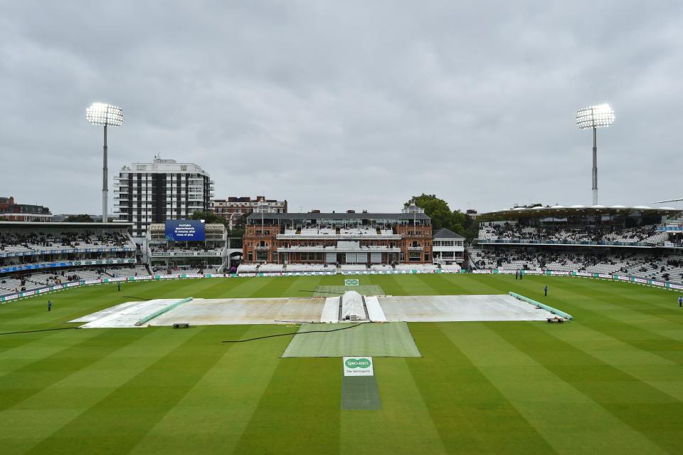 The covers protect the pitch from the rain during a delay in play on the third day of the second Ashes cricket Test match between England and Australia at Lord's Cricket Ground in London on August 16, 2019. (Photo by Glyn KIRK / AFP) / RESTRICTED TO EDITORIAL USE. NO ASSOCIATION WITH DIRECT COMPETITOR OF SPONSOR, PARTNER, OR SUPPLIER OF THE ECB        (Photo credit should read GLYN KIRK/AFP/Getty Images)