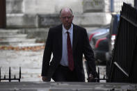 Chief Medical Officer Professor Chris Whitty arrives at 10 Downing Street, before Britain's Prime Minister Boris Johnson's speaks press conference, London, Saturday, Oct. 31, 2020. (AP Photo/Alberto Pezzali, pool)