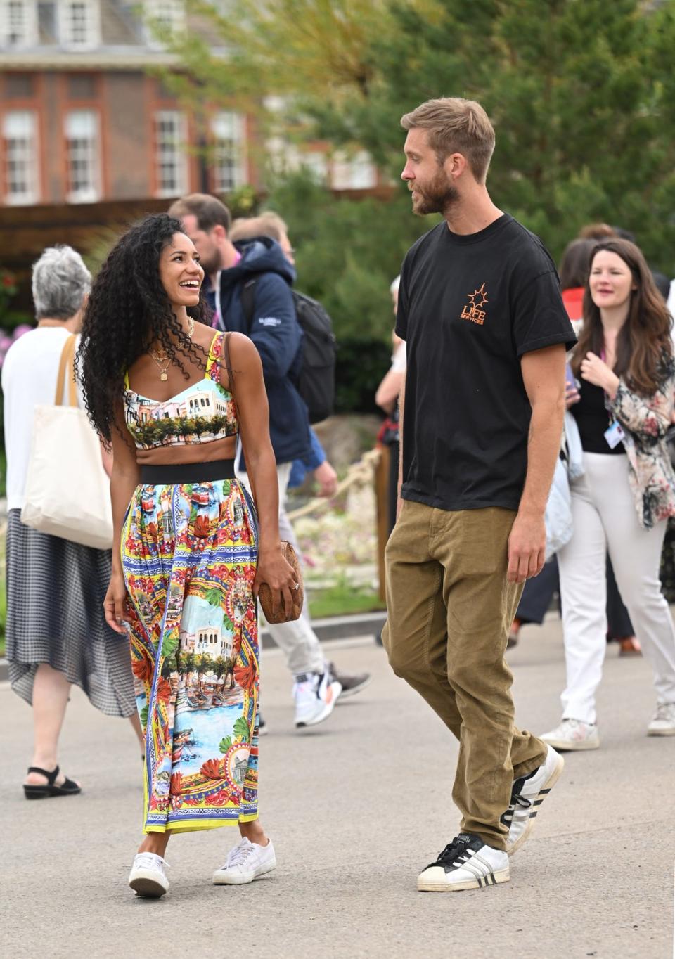 Vick Hope and Calvin Harris stepped out together for the first time at the Chelsea Flower Show on Monday where she was seen sporting an impressive diamond ring on her left hand (WireImage)