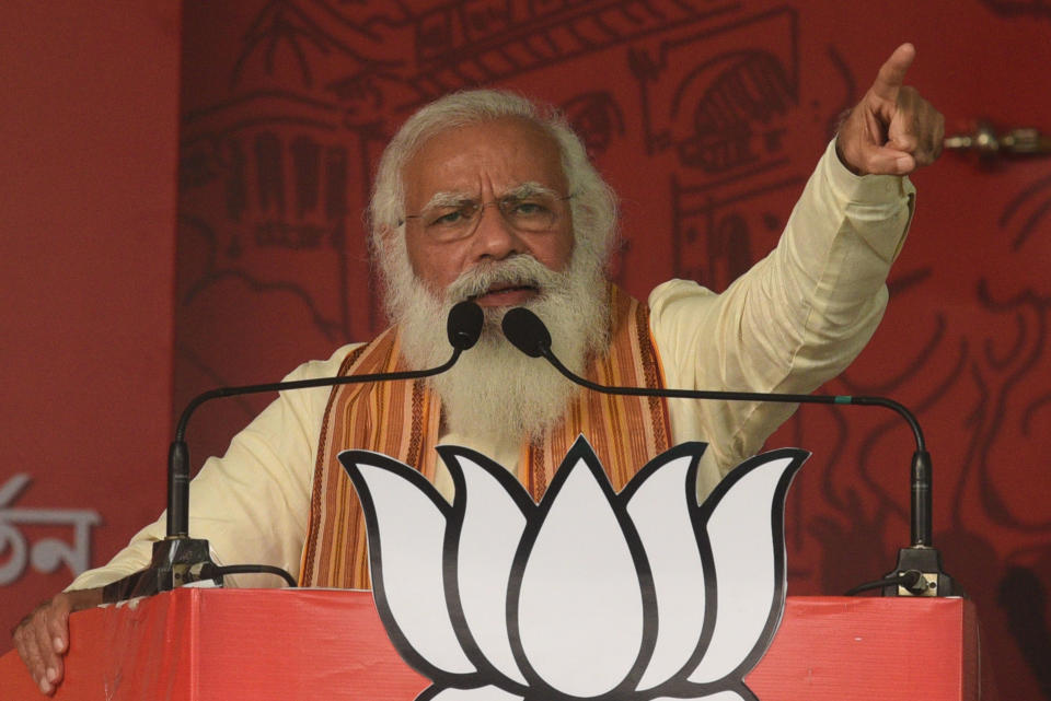 BARASAT, INDIA - APRIL 12:  Prime Minister Narendra Modi addresses a public rally for West Bengal Assembly Election at Barasat on April 12, 2021 in North 24 Parganas, India.  (Photo by Samir Jana/Hindustan Times via Getty Images)