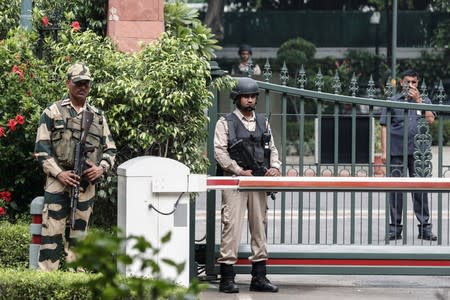 Security personnel stand guard outside Indian Prime Minister Narendra Modi's house in New Delhi
