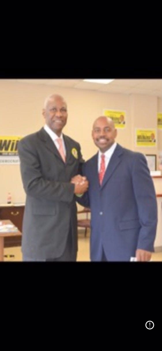 Former Memphis Mayor Willie Herenton, left, poses for a photo with attorney Ricky Wilkins.