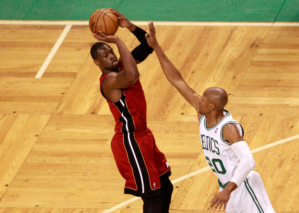 Dwyane Wade of the Miami Heat attempts a shot in the first quarter against Ray Allen #20 of the Boston Celtics in Game Six of the Eastern Conference Finals in the 2012 NBA Playoffs on June 7, 2012 at TD Garden in Boston, Massachusetts. (Photo by Jared Wickerham/Getty Images)