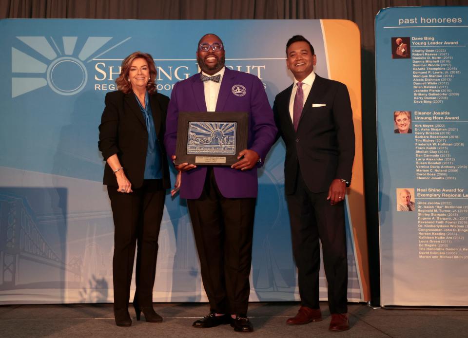 (L to R) Carol Cain, a Detroit Free Press business columnist and host of "Michigan Matters" on CBS 62 with Anthony White, the Eleanor Josaitis Unsung Hero Award winner and Roop Raj, Fox 2 Detroit anchor with Marshall's award at The Mint at Michigan First Conference Center in Southfield on Thursday, October 5, 2023.