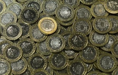 New two pound coins are seen at The Royal Mint, in Llantrisant, Wales, Britain, January 25, 2017. Picture taken January 25, 2017. REUTERS/Rebecca Naden