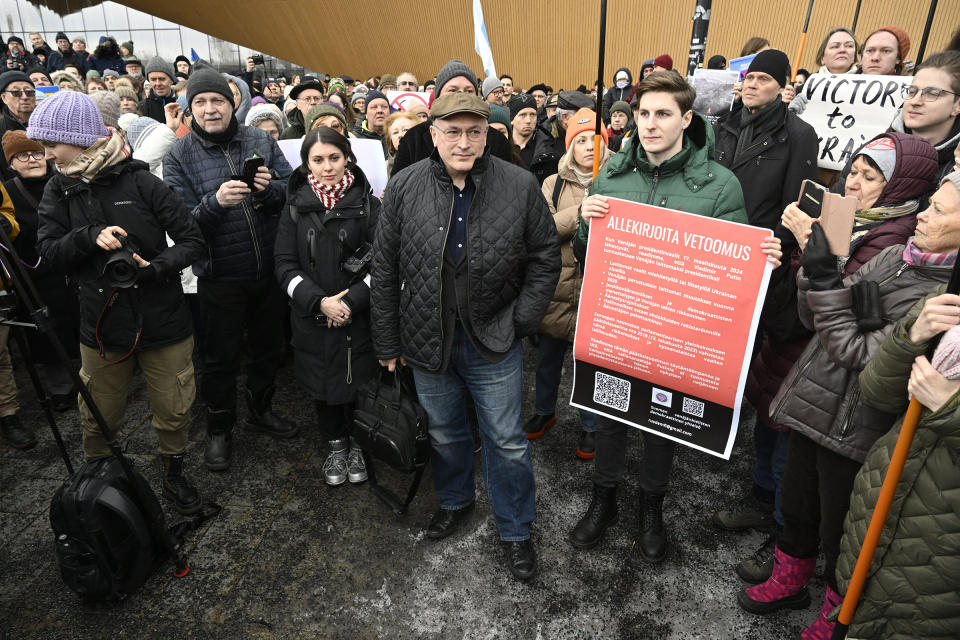 Exiled Russian former oligarch and now opposition figure Mikhail Khodorkovsky (C) takes part in a rally in support for Ukraine, on the second anniversary of Russia's military invasion on Ukraine, in Helsinki on Feb. 25, 2024.<span class="copyright">Heikki Saukkomaa—Lehtikuva/AFP/Getty Images</span>