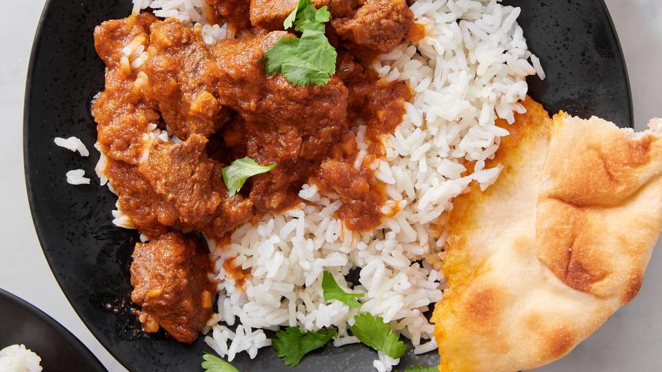 bowl of lamb curry over rice