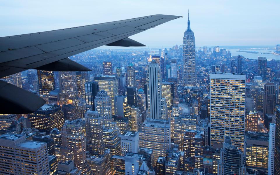 Plane flying over New York City