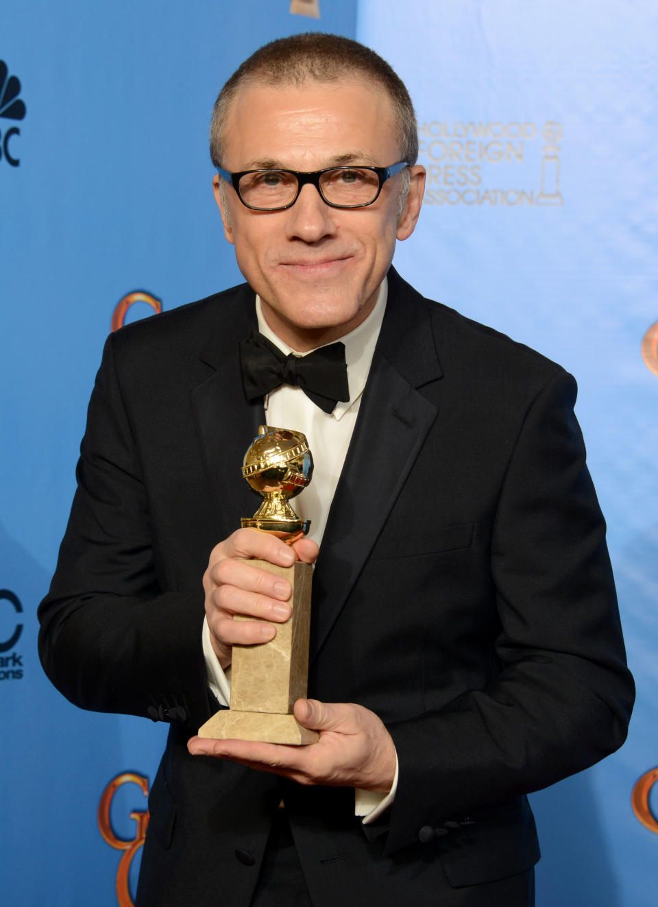 Christoph Waltz poses with the award for best performance by an actor in a supporting role in a motion picture for “Django Unchained” backstage at the 70th Annual Golden Globe Awards at the Beverly Hilton Hotel on Sunday Jan. 13, 2013, in Beverly Hills, Calif. (Photo by Jordan Strauss/Invision/AP)