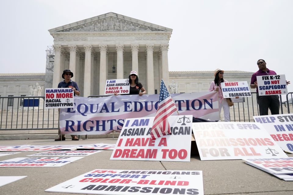 People protest outside of the Supreme Court in Washington, Thursday, June 29, 2023. Days after the Supreme Court outlawed affirmative action in college admissions on June 29, 2023, activists say they will sue Harvard over its use of legacy preferences for children of alumni. (AP Photo/Mariam Zuhaib)