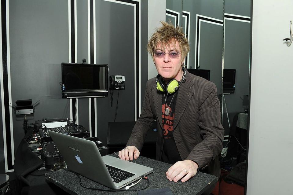 musician andy rourke djing at an event