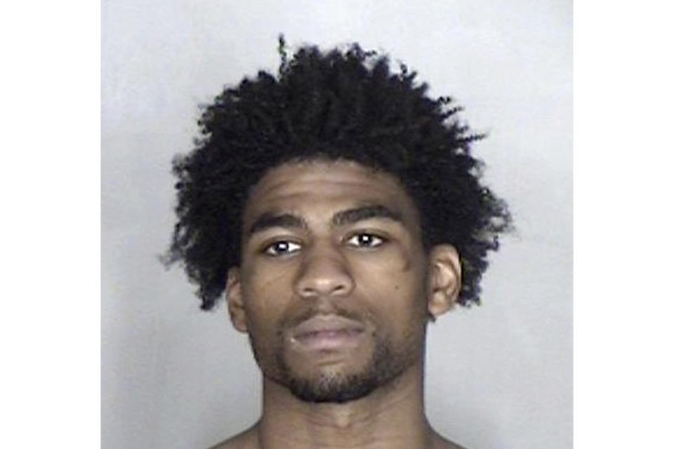 This photo released by the Butte County Sheriff's Office shows Asaahdi Coleman. Authorities say Coleman opened fire on a Greyhound bus in Northern California, killing a 43-year-old woman and wounding four others before he was arrested, naked, inside a nearby Walmart. (Butte County Sheriff's Office via AP)
