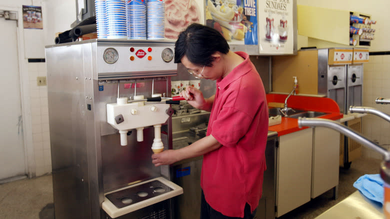 Dairy Queen employee pouring ice cream