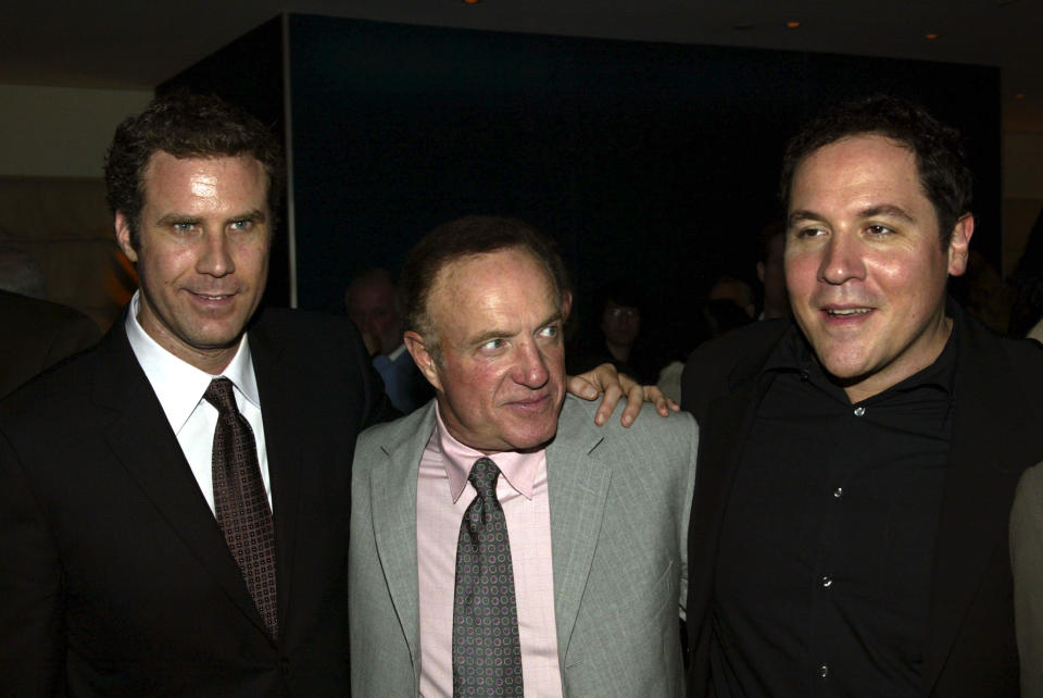 Actors Will Ferrell, left, James Caan, center, and Jon Favreau attend the premiere party for the Movie "Elf" in New York, Nov. 2, 2003. (AP Photo/Mike Appleton) )