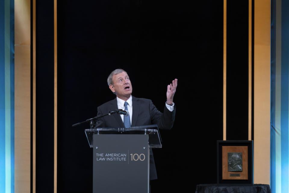Supreme Court Chief Justice John Roberts speaks as her receives the Henry J. Friendly Medal during the American Law Institute's annual dinner in Washington, Tuesday, May 23, 2023. (AP Photo/Jose Luis Magana)
