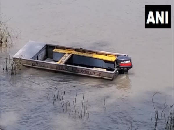 The capsized boat in Yamuna river (Photo/ANI)