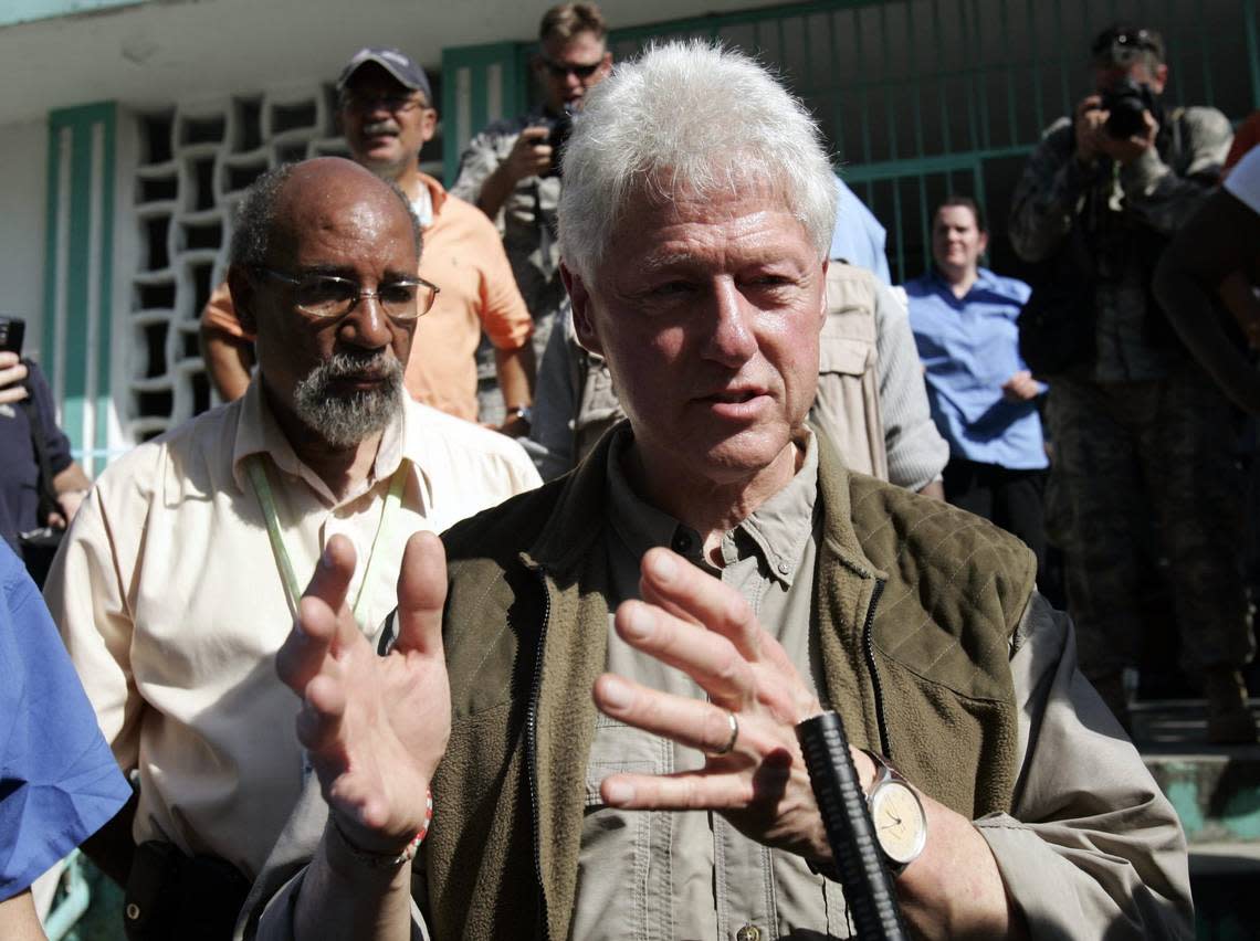 In this file photo from Jan. 18, 2010, Bill Clinton, the former U.S. president, speaks to the press during a tour of the general hospital in Port-au-Prince, Haiti, a week after the devastating 2010 earthquake.