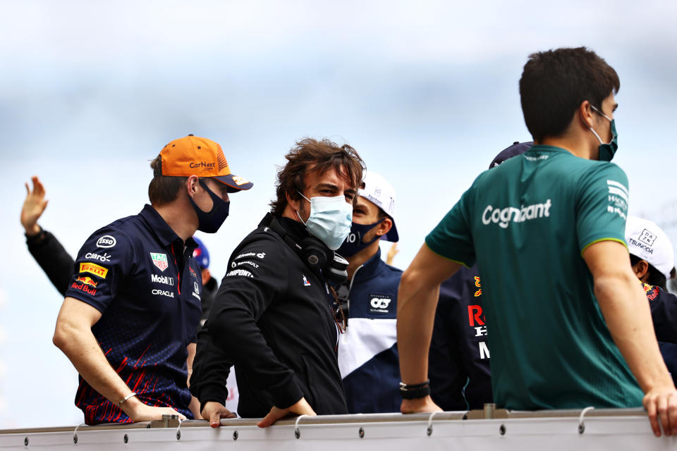 MONTE-CARLO, MONACO - MAY 23: Max Verstappen of Netherlands and Red Bull Racing, Fernando Alonso of Spain and Alpine F1 Team and Lance Stroll of Canada and Aston Martin F1 Team are pictured on the drivers parade ahead of the F1 Grand Prix of Monaco at Circuit de Monaco on May 23, 2021 in Monte-Carlo, Monaco. (Photo by Bryn Lennon/Getty Images)