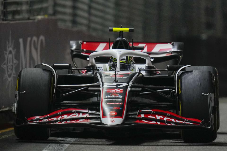 Haas driver Nico Hulkenberg of Germany steers his car during the Singapore Formula One Grand Prix at the Marina Bay Street Circuit, in Singapore, Sunday, Sept. 22, 2024. (AP Photo/Vincent Thian)