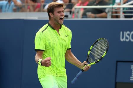 Aug 31, 2016; New York, NY, USA; Ryan Harrison of the United States celebrates after winning match point against Milos Raonic of Canada (not pictured) on day three of the 2016 U.S. Open tennis tournament at USTA Billie Jean King National Tennis Center. Mandatory Credit: Geoff Burke-USA TODAY Sports