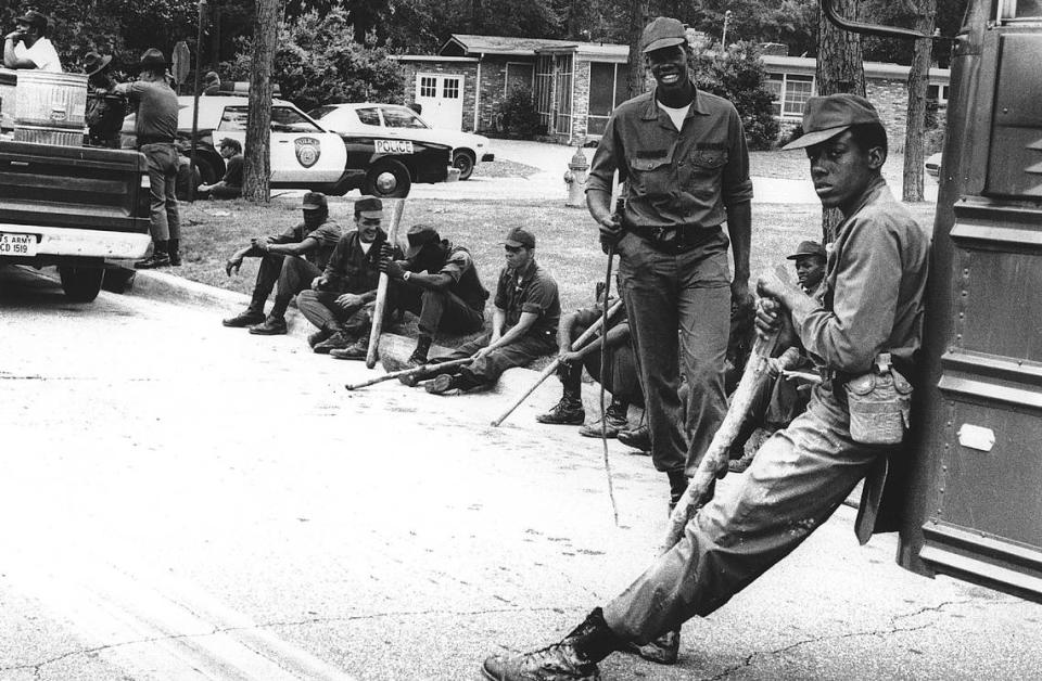 Soldiers in Oakland Park await rides back to Fort Benning during the search for Dawn Worth in April 1978.