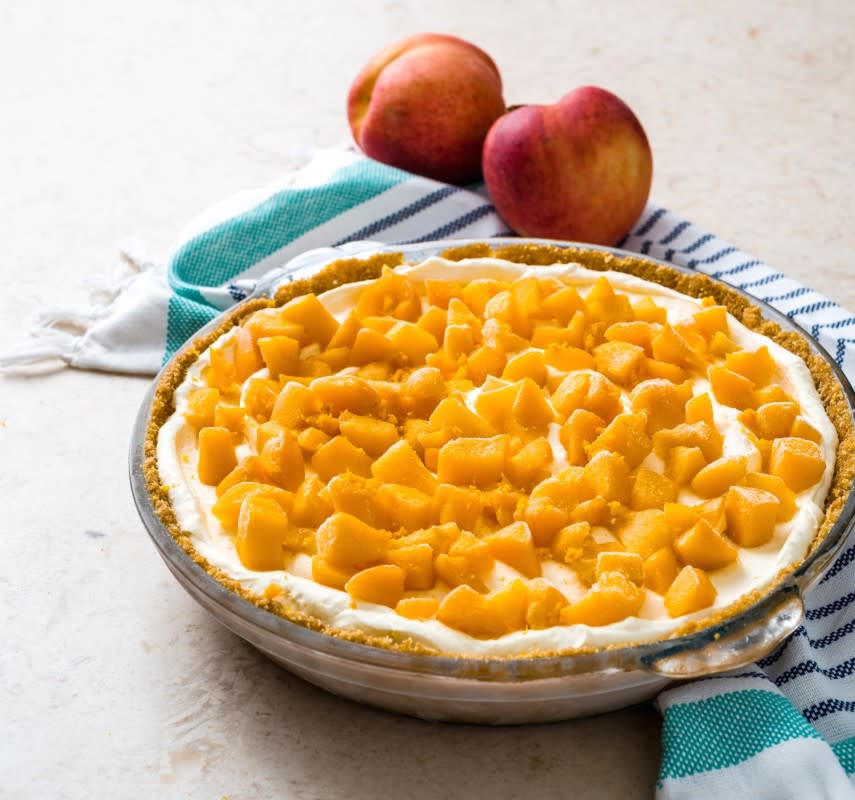 <p>Callie Blount</p><p>Mango gives this pie an extra layer of sweetness.</p><p><strong>Get the recipe: <a href="https://parade.com/841879/jocelynruggiero/no-bake-peach-mango-pie/" rel="nofollow noopener" target="_blank" data-ylk="slk:No-Bake Peach Mango Pie;elm:context_link;itc:0;sec:content-canvas" class="link rapid-noclick-resp">No-Bake Peach Mango Pie</a></strong></p><p><strong>Related: <a href="https://parade.com/844038/felicialim/28-perfect-peach-recipes-for-summer/" rel="nofollow noopener" target="_blank" data-ylk="slk:35 Perfect Peach Recipes;elm:context_link;itc:0;sec:content-canvas" class="link rapid-noclick-resp">35 Perfect Peach Recipes</a></strong></p>