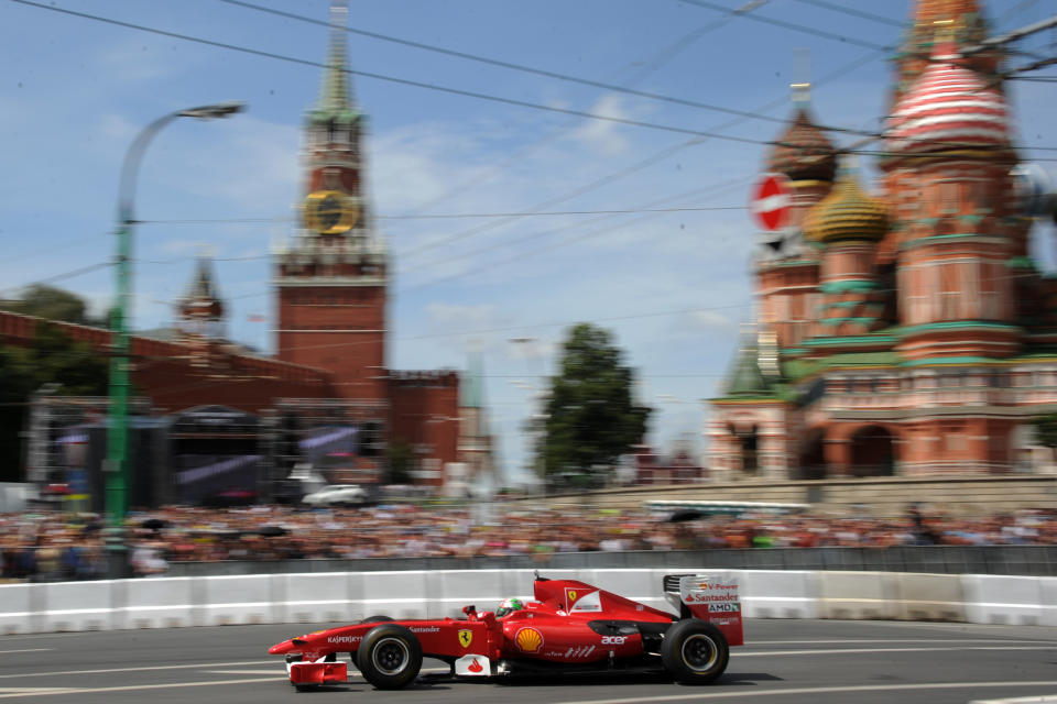 Formula One Scuderia Ferrari team driver Giancarlo Fisichella speeds past St. Basil's Cathedral during the "Moscow City Racing" show on July 15, 2012 in central Moscow. AFP PHOTO / KIRILL KUDRYAVTSEVKIRILL KUDRYAVTSEV/AFP/GettyImages