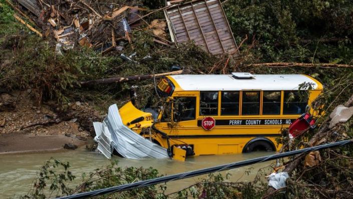 Image of a school bus in a creek