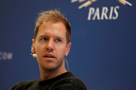 Ferrari's Formula One driver Sebastian Vettel attends the FIA Champions news conference for FIA Prize Giving 2017 in Paris, France December 8, 2017. REUTERS/Gonzalo Fuentes