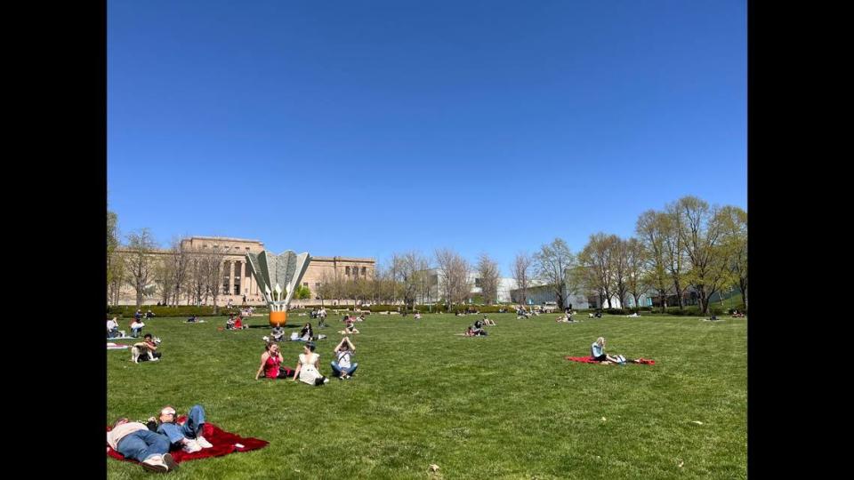 The lawn at the Nelson-Atkins Museum of Art was a popular destination for people watching the eclipse Monday.