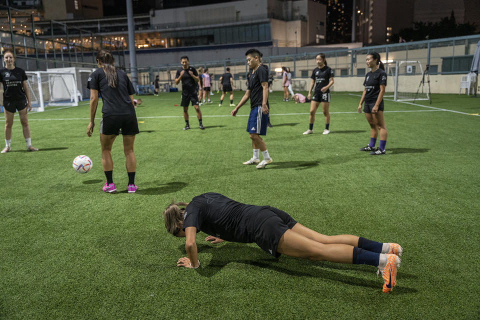 Women's seven-a-side team train in Happy Valley ahead of the Gay Games in Hong Kong, Tuesday, Oct. 31, 2023. Set to launch on Friday, Nov. 3, 2023, the first Gay Games in Asia are fostering hopes for wider LGBTQ+ inclusion in the Asian financial hub. (AP Photo/Chan Long Hei)