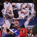 Football fan James Spearman, of Avon, Conn., reacts as Texas A&M quarterback Johnny Manziel is selected by the Cleveland Browns as the 22nd pick in the first round of the 2014 NFL Draft, Thursday, May 8, 2014, in New York. (AP Photo/Craig Ruttle)
