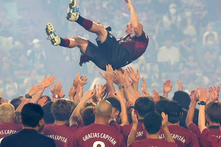 Vissel Kobe's Andres Iniesta is tossed up during his farewell ceremony following the J-League football match between Vissel Kobe and Hokkaido Consadole Sapporo in Kobe on July 1, 2023. (Photo by JIJI PRESS / AFP) / Japan OUT